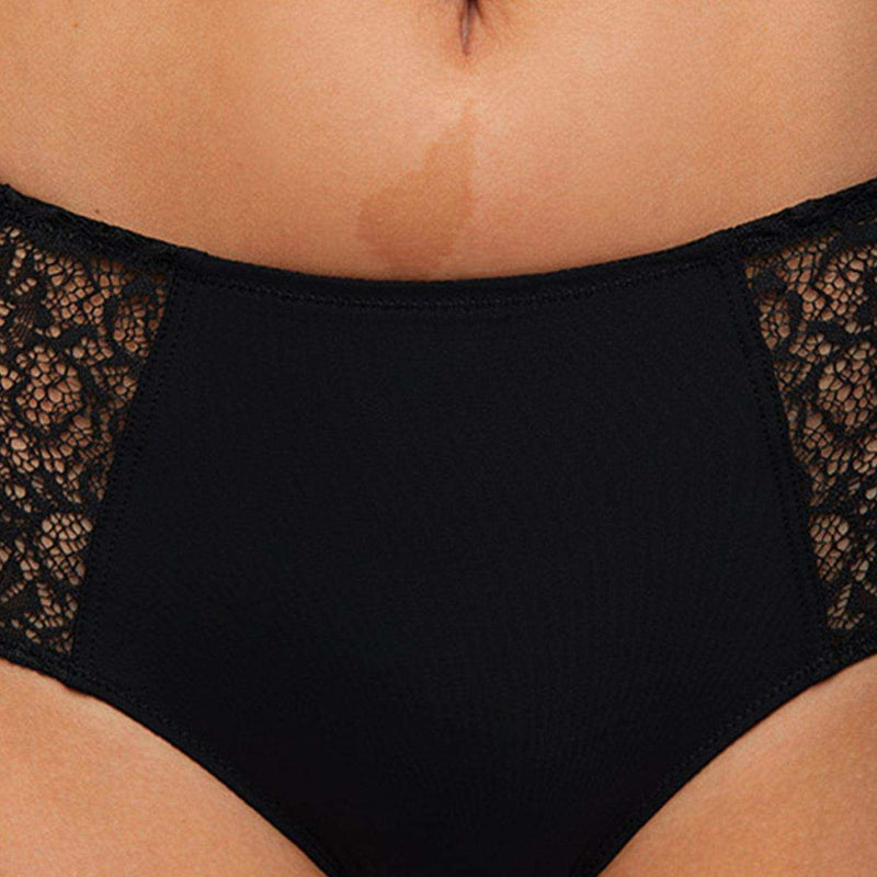 Model wearing a Liberté Crosby Mid Rise Hipster in black, featuring Crosby performance micro jersey and lace insets.