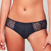 Model wearing a Liberté Bowery Scalloped Hipster, with a semi sheer lace front and sheer mesh sides in midnight blue.