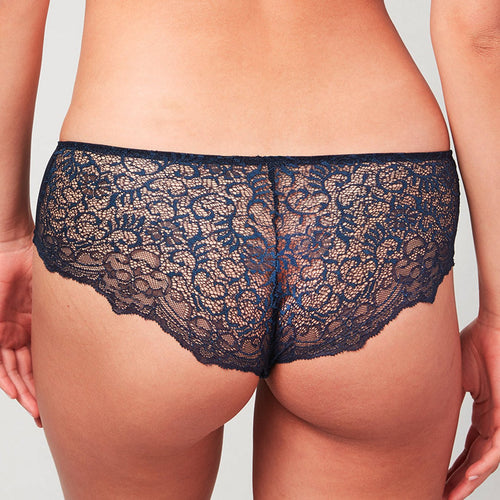 Back view of model wearing a Liberté Bowery Scalloped Hipster featuring a sheer allover lace with scalloped edges in midnight blue.