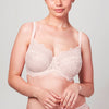 Model wearing Blush pink Liberté Bowery Lace Demi bra featuring a 3 piece cup and all over sheer lace with scalloped edges.