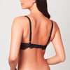 Back view of model wearing a black Liberté Bowery Lace Demi Bra with scalloped edges on the band